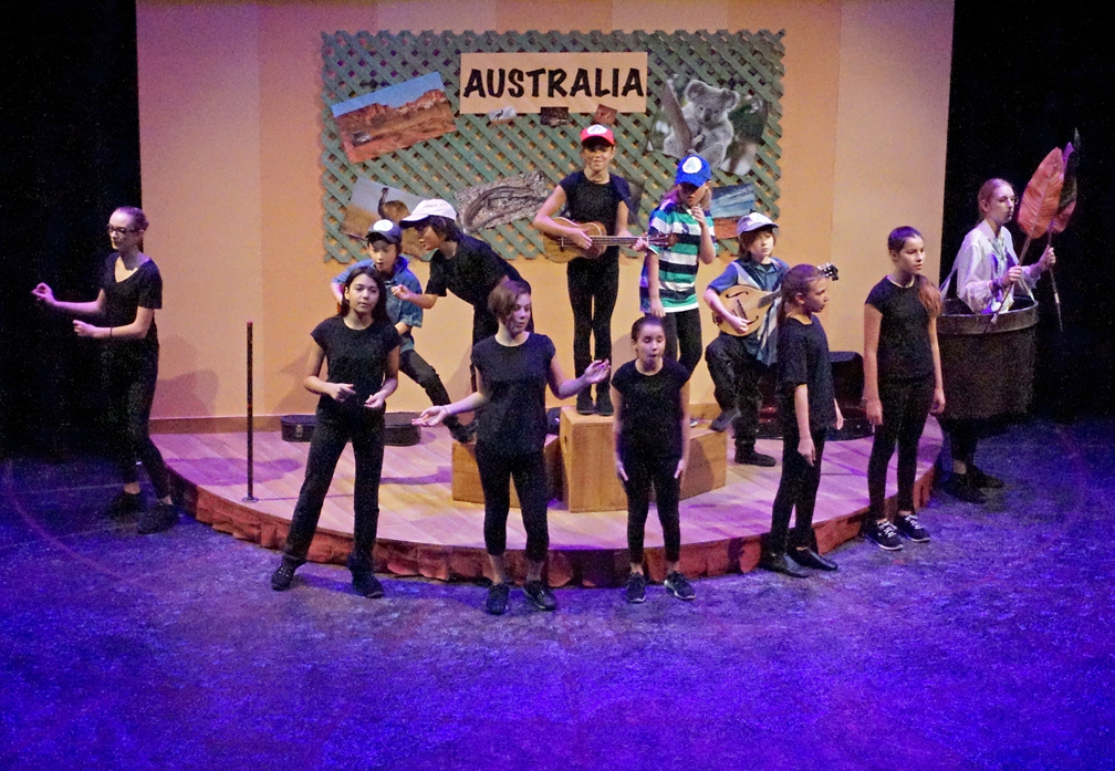 the cast singing the Australia song on the "Australia" set
